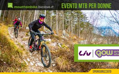 foto di Beatrice Pontalti, redattrice e tester di Bicilive.it, con una bici Liv in un bosco e due ragazze che seguono.